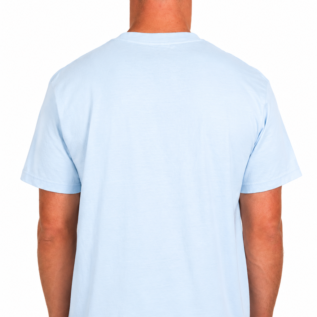 Male model wearing a light blue Sandtrap T-shirt shown from the back with a blank design. Photographed against a clean white studio background to showcase the fit and silhouette.