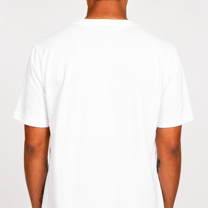 Male model wearing the white Amateurs Sandtrap T-shirt shown from the back, highlighting the blank design and relaxed fit against a clean studio background.